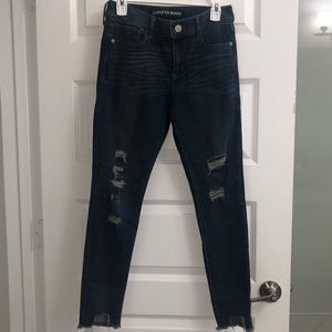 Express distressed mid rise jeans